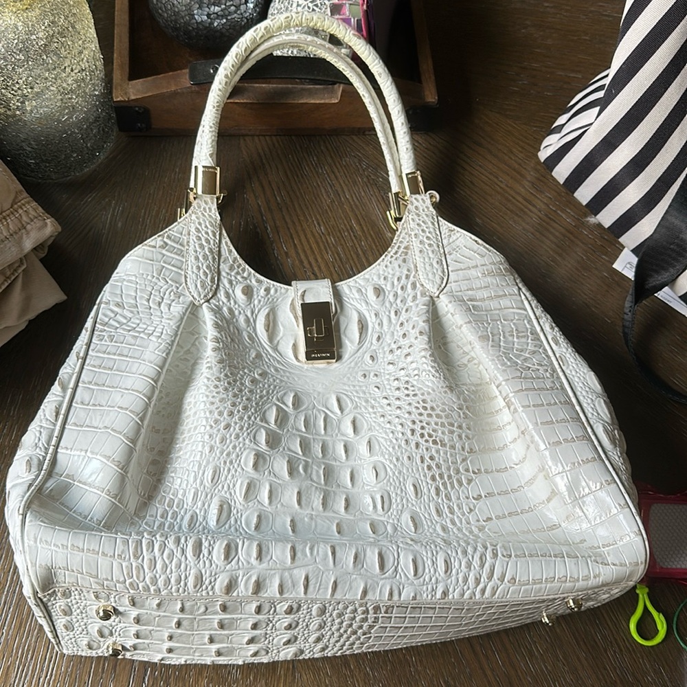 White purse work texture design and gold touches